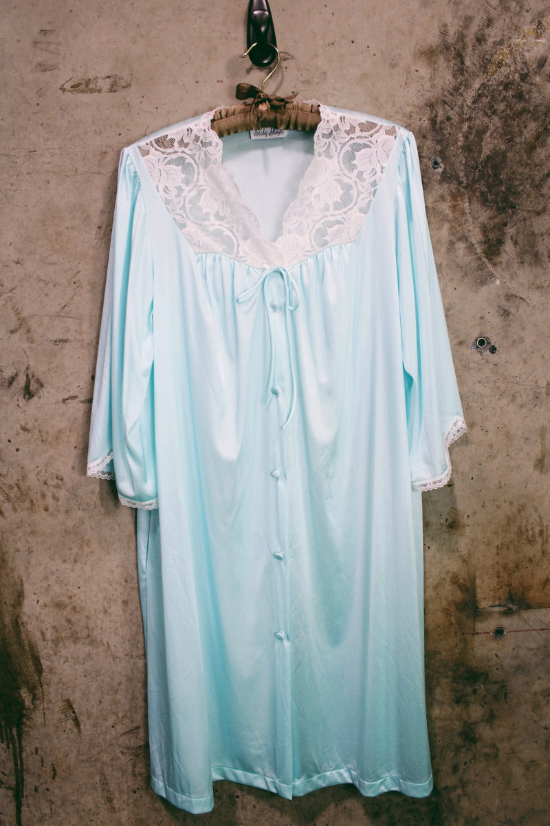 Women's vintage 1980's Fashion by Becky Sharpe, Made in USA label light blue nightie top with short sleeves and lace trim throughout.