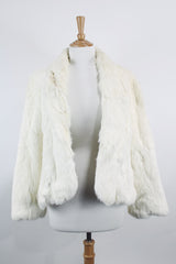 Women's vintage 1970's Wilsons Suede & Leather, Made in Korea label long sleeve bright white genuine fur coat with one hook and eye closure in the front. 