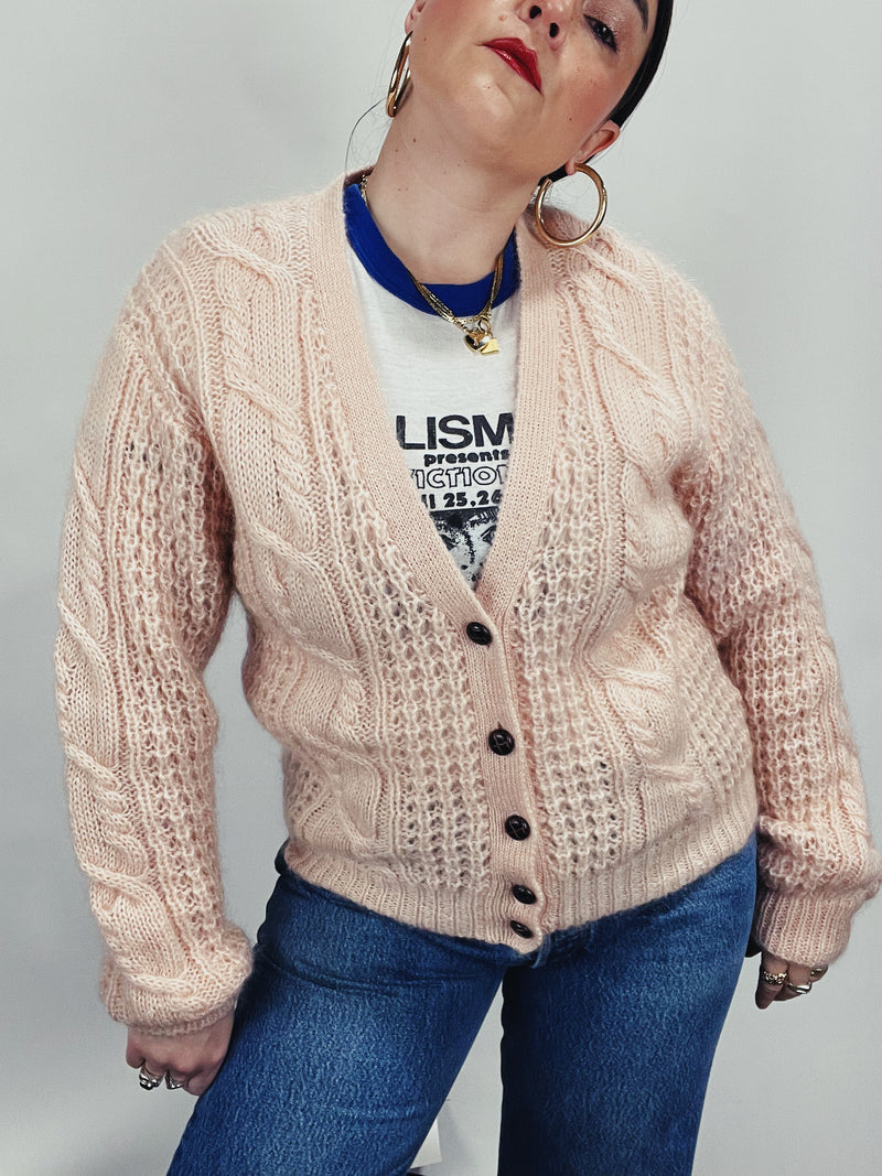 Women's vintage 1990's Karen Scott label long sleeve pale pink mohair button up cardigan with cable knit texture.