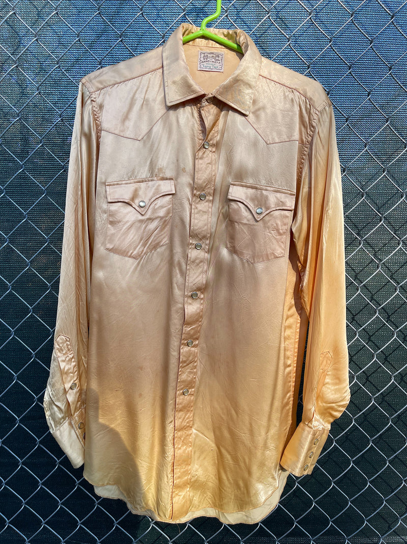 Men's vintage 1950's H Bar C Ranchwear, Long Tail label long sleeve western shirt in satin yellow color with pearly snap buttons. 