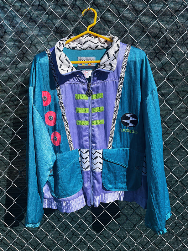 Vintage 1990's Ixspa by Jamie Sadock label funky long sleeve zip up satin track jacket with all over abstract details. 