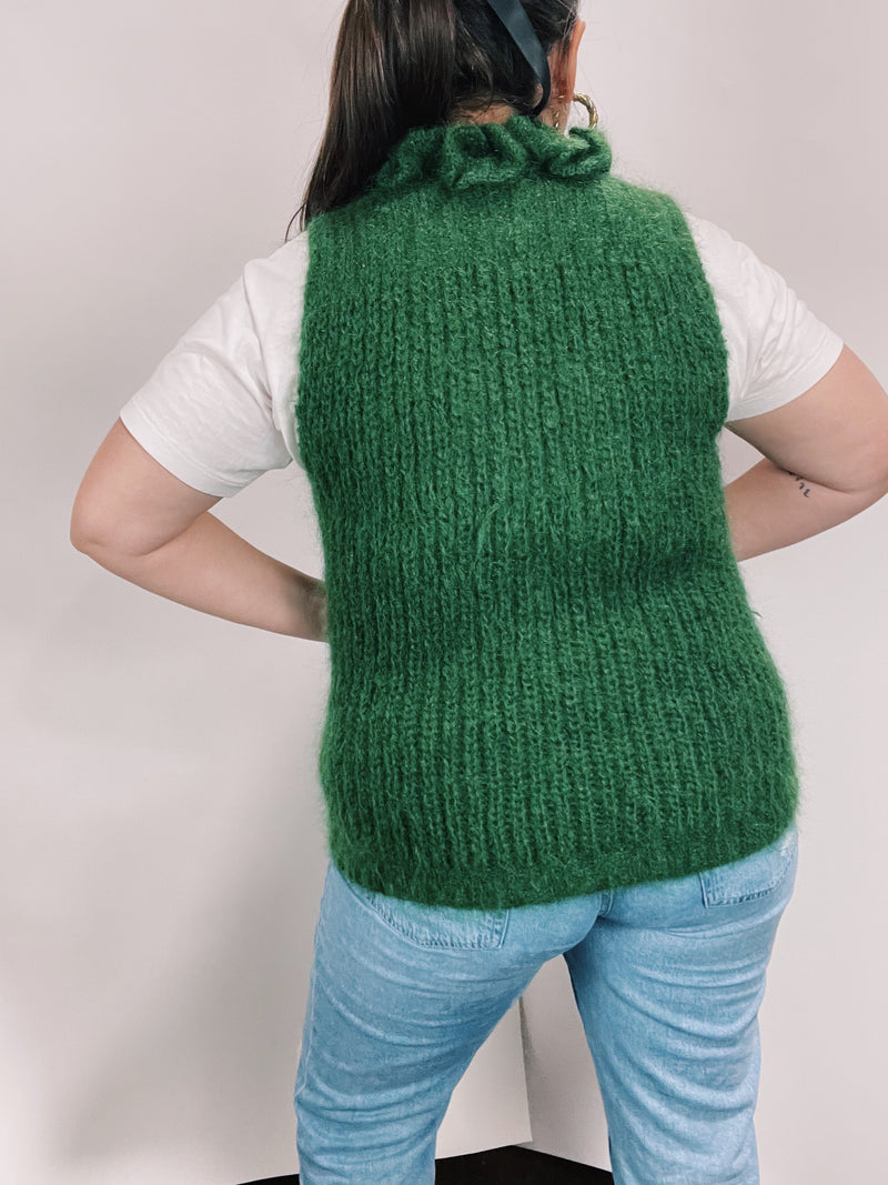 sleeveless green mohair sweater vest with ruffle trim