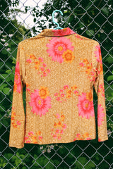 Women's vintage Y2k TropHappy label long sleeve top with collar and silver snap buttons up the front. Tan with all over bright pink flowers.