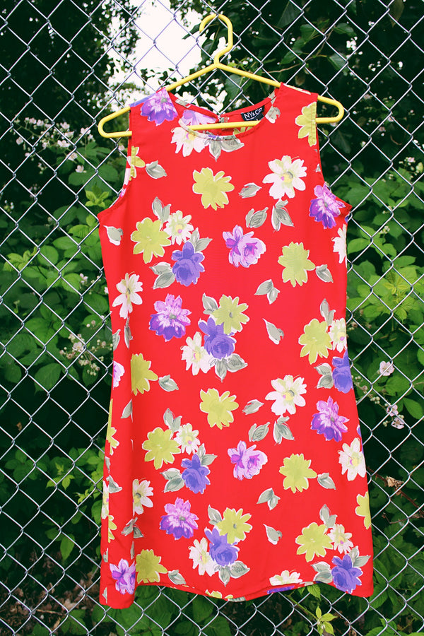 Women's vintage 1990's NY & CO label sleeveless mini dress in a lightweight polyester material in red with all over multicolored floral print.