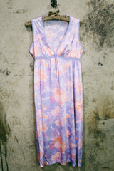 Women's vintage 1980's sleeveless midi length nightie dress in light purple, pink, and peach all over tie dye print. Has lace trim.