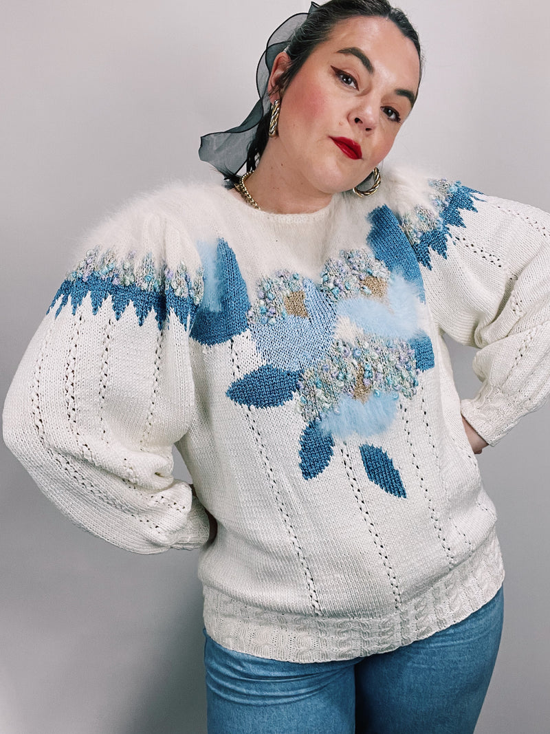 white long sleeve pullover sweater with blue pattern
