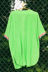 Women's vintage 1980's David Brown for Saks Fifth Avenue short sleeve mini length zip up towel material dress in a vibrant lime green and printed pink trim.