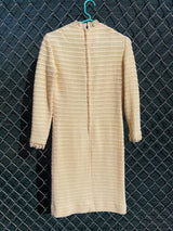 Women's vintage 1970's Maggi label long sleeve short length cream colored crochet dress with lace trim and mock neck. 