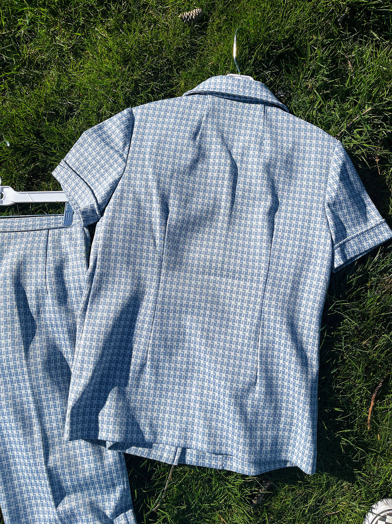 Women's vintage 1970's matching pant set with pants and button up shirt blouse in blue and white gingham polyester material. 