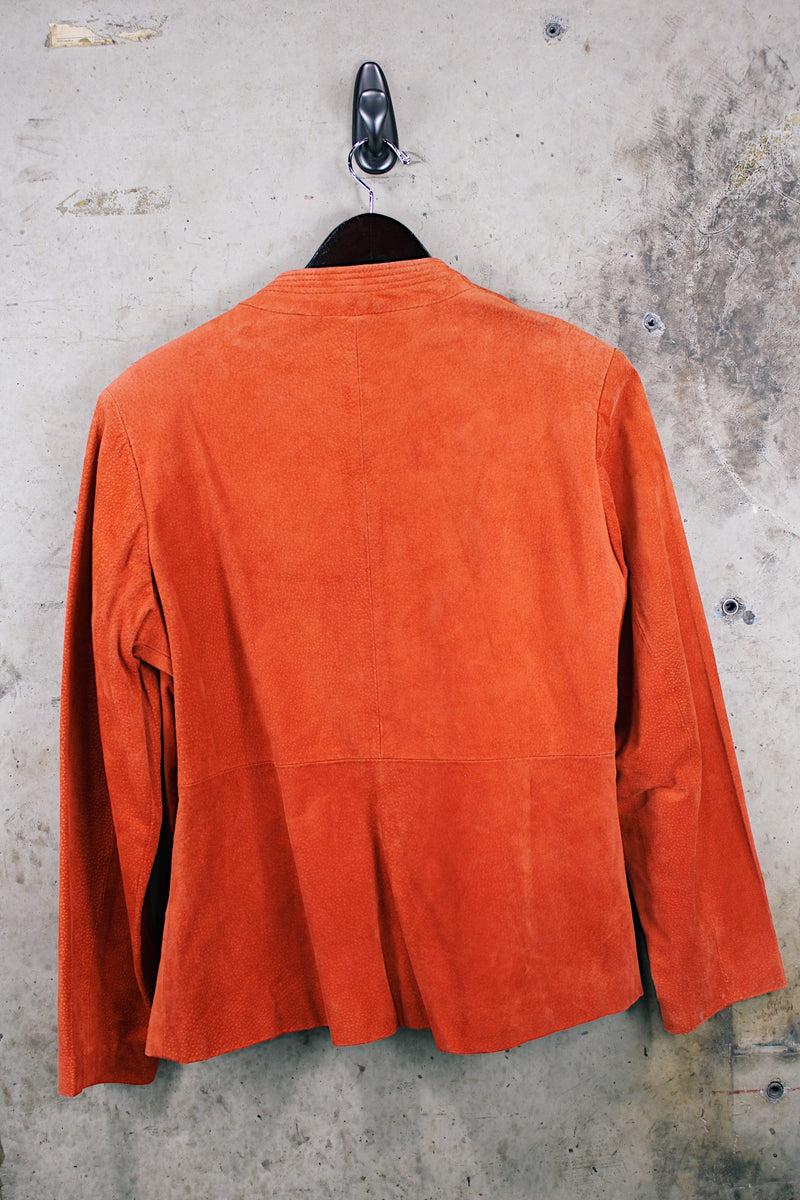Women's vintage 1970's Deerskin Quality Leathers long sleeve open front lightweight suede leather jacket in a vibrant burnt orange color. 