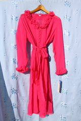 long sleeve sheer hot pink midi dress with tie waist and ruffled neckline and cuffs vintage 1970's