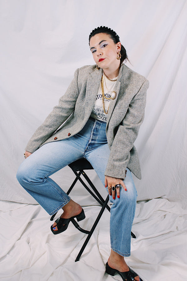 Men's or women's vintage 1960's Nordstrom, Harris Tweed, Tailored in the USA label long sleeve grey colored wool blazer with front pockets and partial lining.