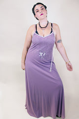 Women's vintage 1980's sleeveless ankle length purple dress with spaghetti straps and bead and sequins across chest.