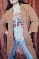 Women's vintage 1970's Joseph Magnin label long length long sleeve camel brown tan colored suede open front jacket.