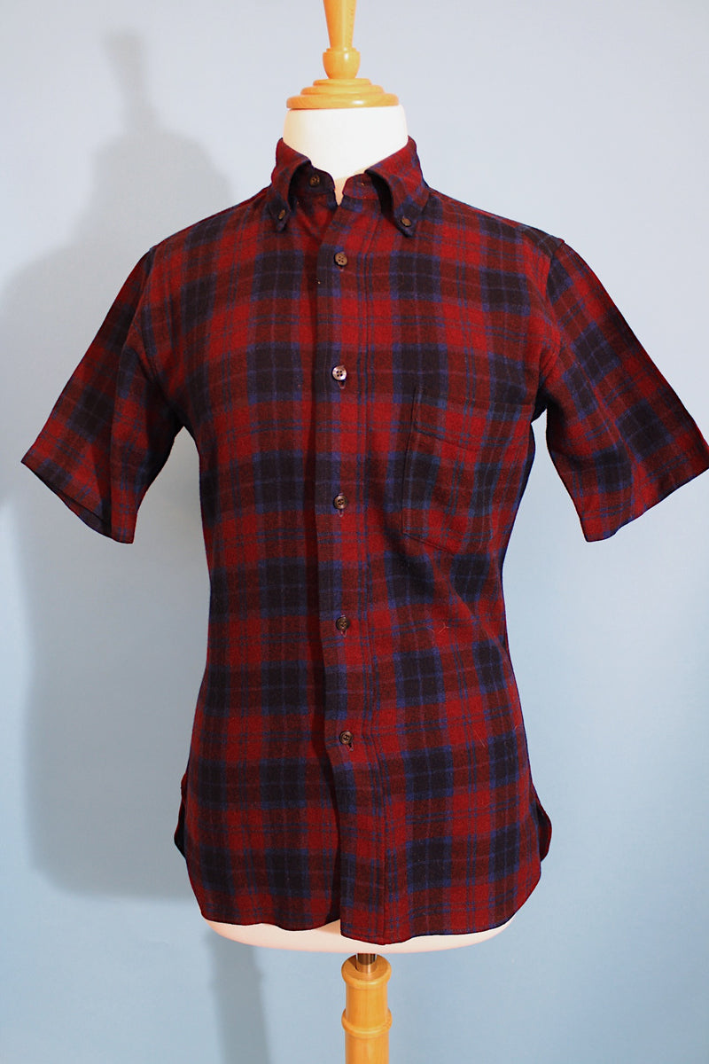 Men's vintage 1960's Quality Tailoring, Him, Made in Japan label short sleeve button up plaid shirt in a wool and nylon blend material. Navy and maroon colors. 