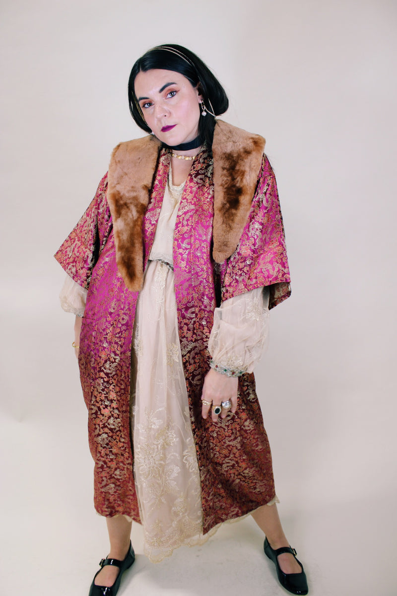 Women's vintage 1970's long sleeve long length maroon colored kimono robe jacket. Gold all over print. Front pockets and comes with matching tie belt.