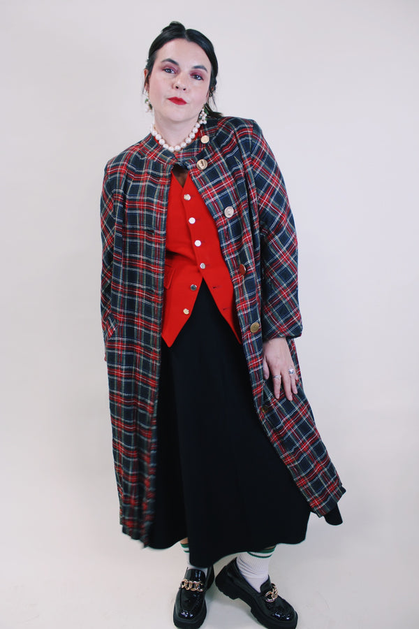 Women's vintage 1960's long label long length plaid tartan print jacket in black and red with gold buttons. Fully lined and has side pockets. 