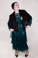 Women's vintage 1960's brown colored genuine fur stole lightweight jacket. Fully lined with an open front.