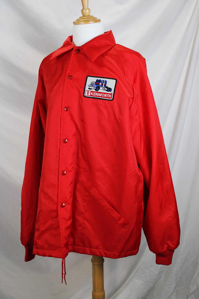 Men's or women's vintage 1980's Swingster, World of Wearables label long sleeve lightweight Nylon red windbreaker with popper buttons up the front, a patch, and furry fleece liner