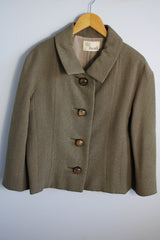 Women's vintage 1950's Harold, Monte-Sano & Pruzan, New York label nubby wool textured grey colored jacket with big grey buttons and small peter pan collar.