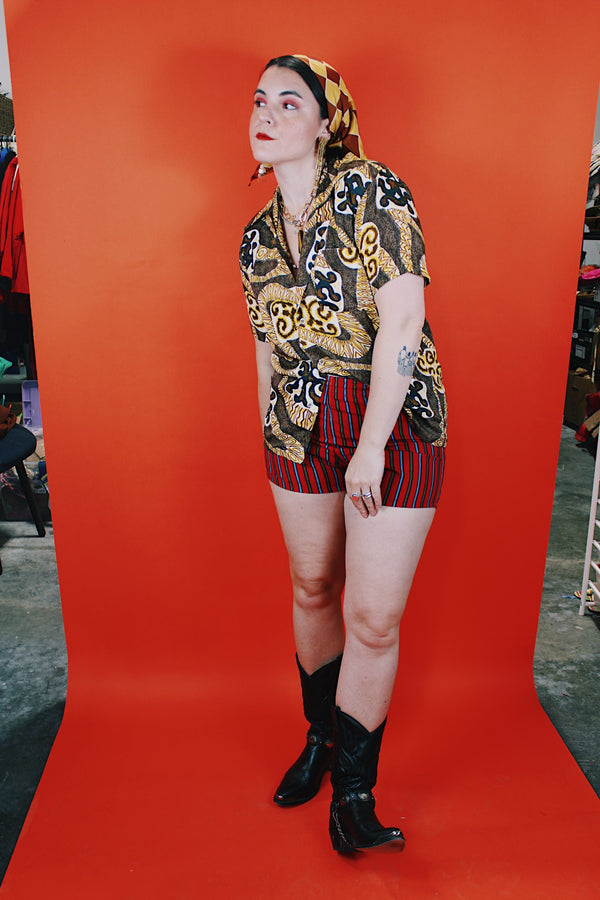 Women's or men's vintage 1970's Aloha Authentic Hand-Screened Originals label short sleeve Hawaiian print button up collared shirt in yellow, white, and brown colors.