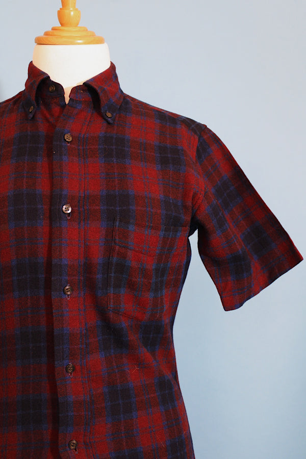 Men's vintage 1960's Quality Tailoring, Him, Made in Japan label short sleeve button up plaid shirt in a wool and nylon blend material. Navy and maroon colors. 