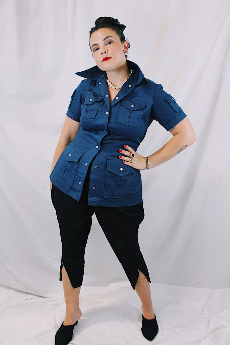 Women's vintage 1970's K Mart, Satisfaction Always, Made in Japan label navy blue shirt with dagger collar, silver popper buttons, and lots of pockets.