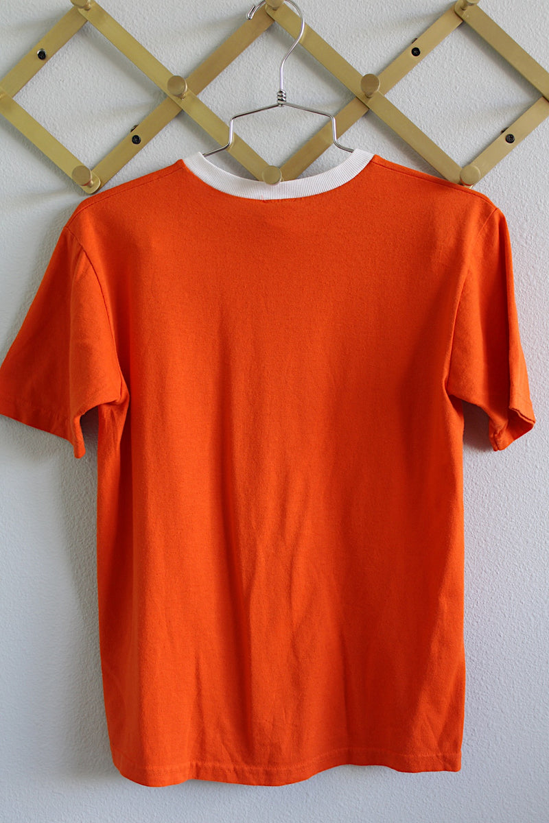 Women or men's vintage 1990's Boy Scouts of America Official Uniform label short sleeve bright orange tee with white trim around neckline and graphic of tigers on left chest.