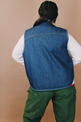 Men's vintage 1970's Roebucks, Sears label size XL sleeveless dark denim vest with cream shearling liner and popper buttons.