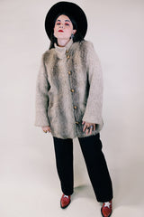 Women's vintage 1980's Lifestyle 80's by Andrea Ungar label long sleeve jacket with faux fur body in front and back and acrylic arms. Buttons up the front with side pockets. 