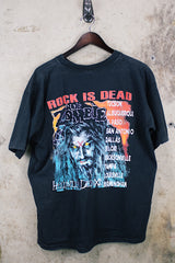 Women's or men's vintage 1999 Royal Avalon, Made in Mexico label short sleeve black Korn and Rob Zombie Rock is Dead tour tee with colored graphic on front and back.