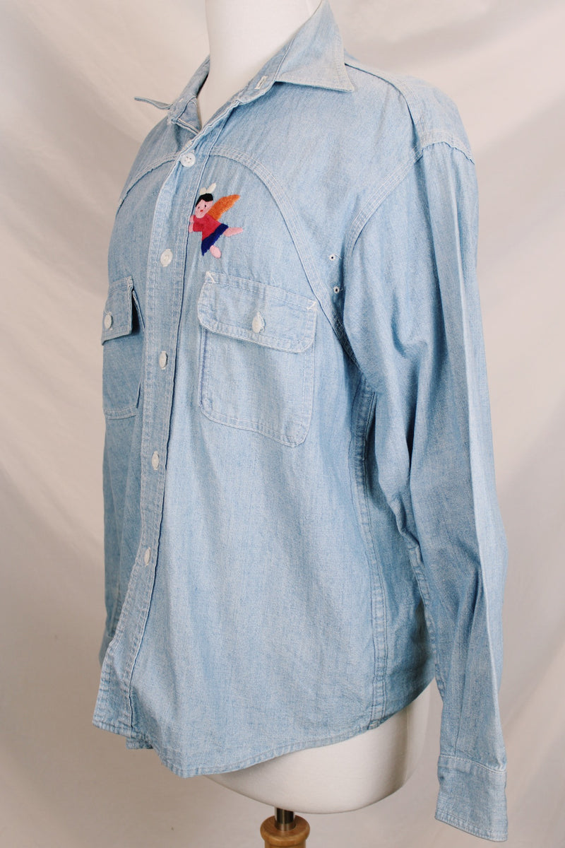 Men's or women's vintage 1970's Lepe, Puerto Vallarta, Mexico label long sleeve light blue denim wash chambray button up shirt with colored embroidery in the front and back.