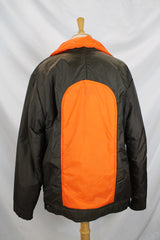 Women's or men's vintage 1970's Cascade, Made in Korea label long sleeve zip up brown and orange colored nylon puffer jacket.