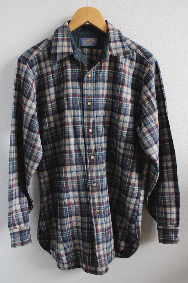 Men's vintage 1980's Pendleton label long sleeve button up wool shirt in size medium. All over grey and blue plaid print