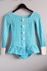 Women's vintage 1970's long sleeve light blue and white checkered bodysuit with ruffled trim, cuffs, and decorative buttons.