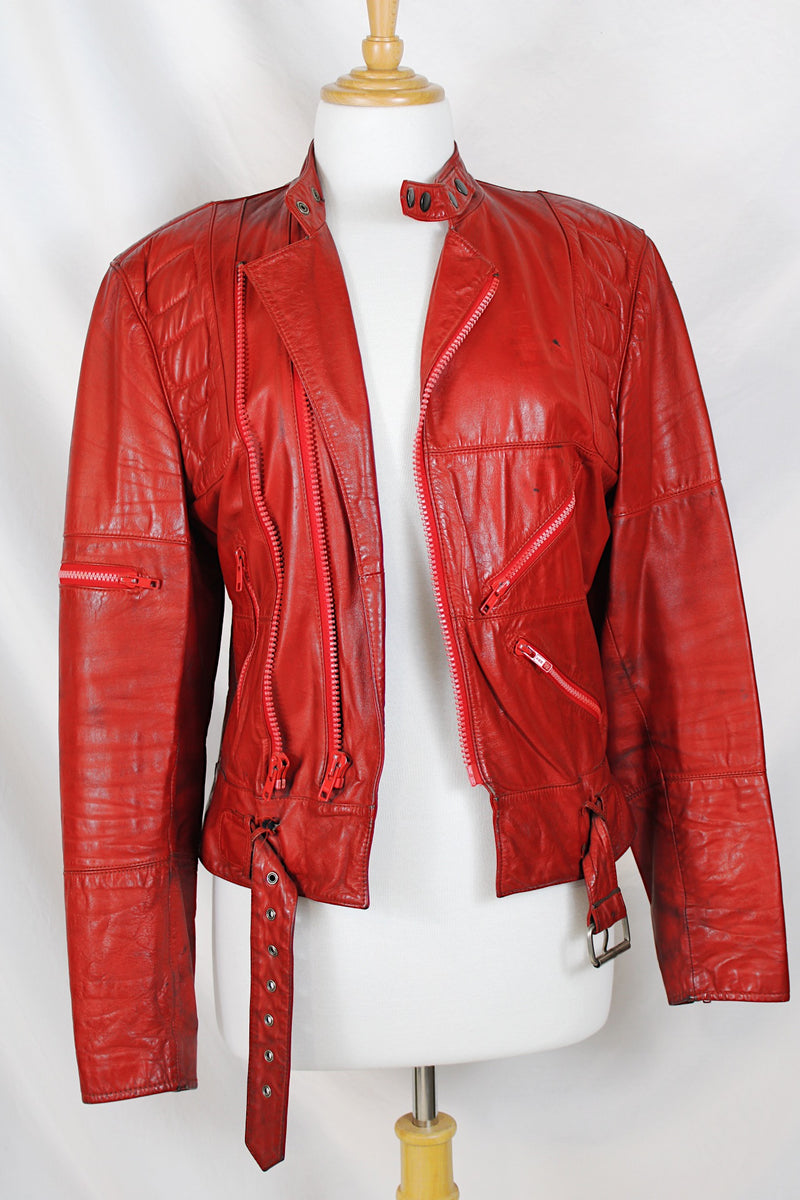 Women's or men's vintage 1980's Wilson's Suede & Leather long sleeve zip up short fit bright red leather moto style jacket. 