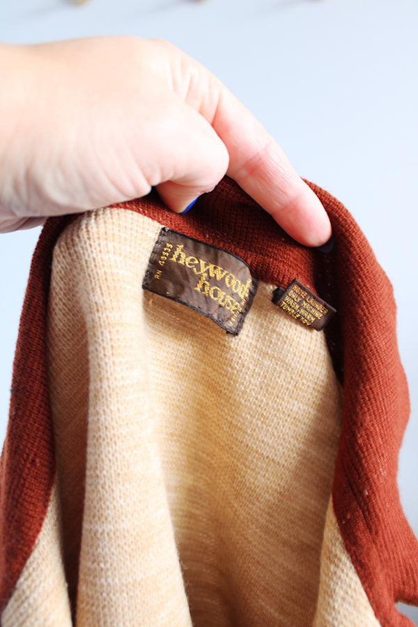 Men's or women's vintage 1970's Heywood House label long sleeve pullover sweater with a collar and half zip closure in a burnt orange and tan colors. 