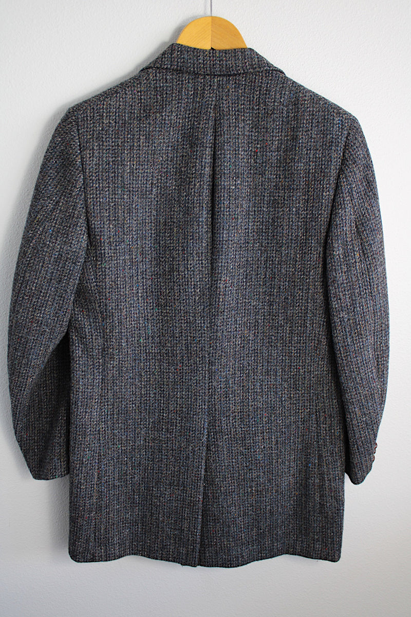 Men's vintage 1960's Nordstrom, Harris Tweed, Tailored in the USA label long sleeve button up blazer in a blue wool material. Fully lined and has brown leather buttons