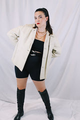 Women's vintage 1960's Custom Made Genuine Native Deerskin label long sleeve cream colored leather jacket. Fully lined, side pockets, and leather covered buttons.