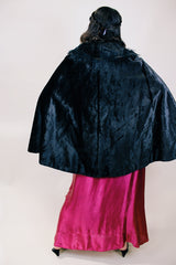 Women's vintage possibly 1940's black colored pony fur large cape poncho with fur trim around the edges. Has a closure at the neck and the peter pan collar and fully lined.