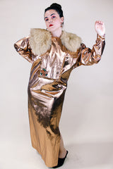 Women's vintage 1980's Original by Freida label long sleeve long length bronze metallic costume dress with a bib in front and back.