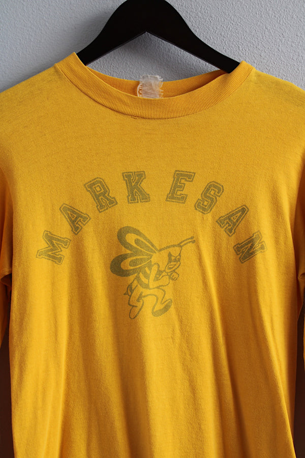 Men's or women's vintage 1980's long sleeve yellow t-shirt with graphic and text on front, back, and on arms in a cotton material. 