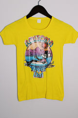 Women's or kids vintage 1970's short sleeve bright yellow tee with colored river rat graphic on the front in a polyester and cotton material. 