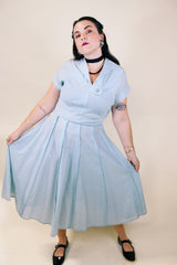 Women's vintage 1960's Toni Todd Original label short sleeve midi length light blue sheer a line dress.