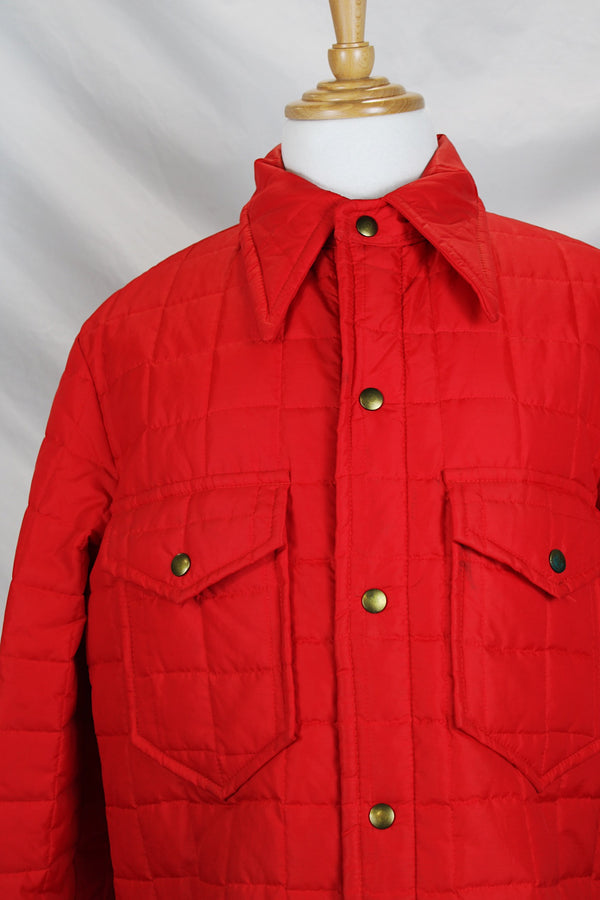 Men's or women's vintage 1980's Minnesota Woolen, Amalgamated Workers of America label long sleeve red nylon quilted lightweight puffy jacket with popper buttons.