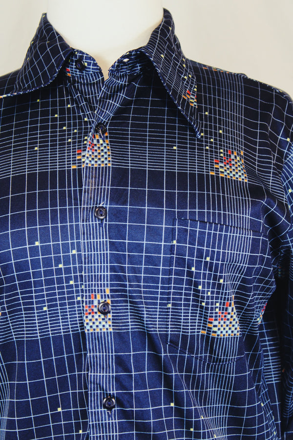 Men's or women's vintage 1970's Chemise Et Cie label long sleeve navy button up shirt with dagger collar and all over multi colored abstract print in slinky shiny polyester material.