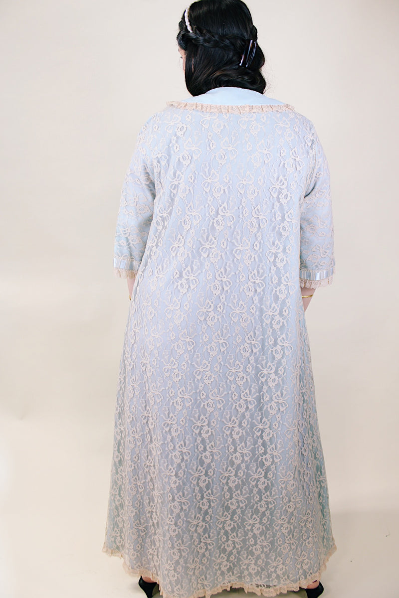 Women's vintage 1970's I. Magnin, Odette Barsa label long length short sleeve baby blue cream lace duster robe jacket with ribbon trim and peter pan collar. 