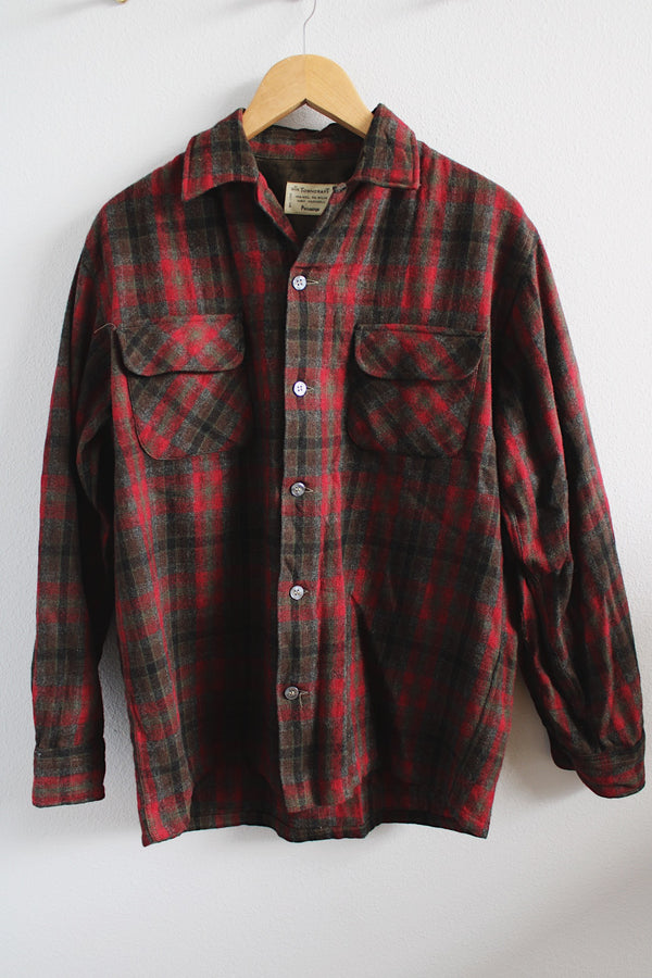 Men's vintage 1960's Towncraft, Penneys, Made in Japan label size medium long sleeve button up wool shirt. All over red and brown plaid print. Two chest pockets.