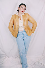 Women's vintage 1970's Creaciones Exclusivas, Cevy's, Made in Mexico label long sleeve tan brown leather jacket. Western style. Button closure and fully lined