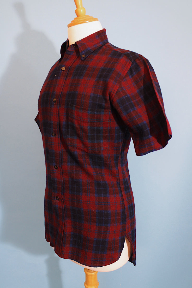 Men's vintage 1960's Quality Tailoring, Him, Made in Japan label short sleeve button up plaid shirt in a wool and nylon blend material. Navy and maroon colors. 